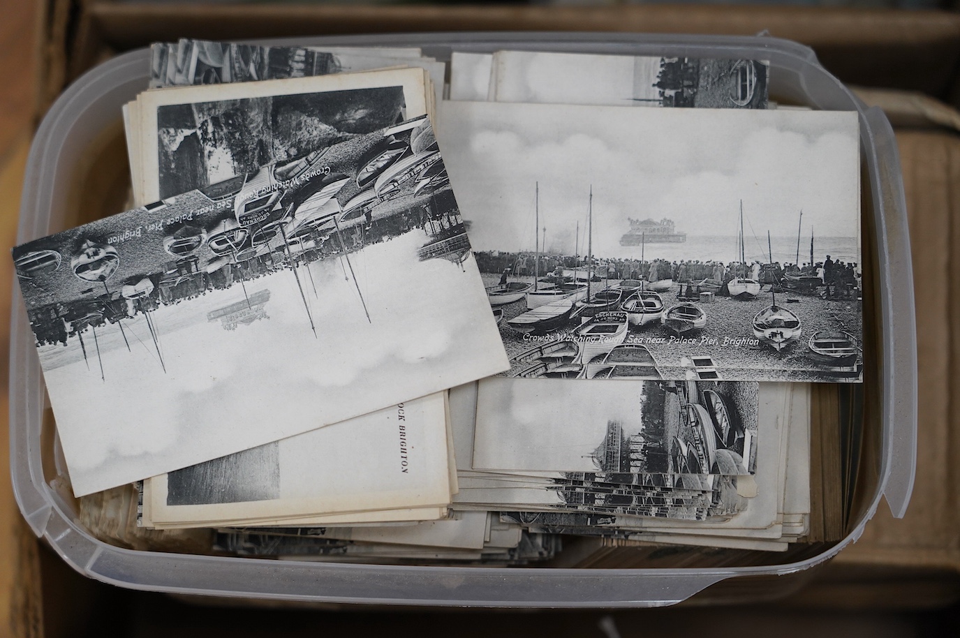A large quantity of Brighton and Hove, and surrounding area postcards, many duplicates. Condition - fair